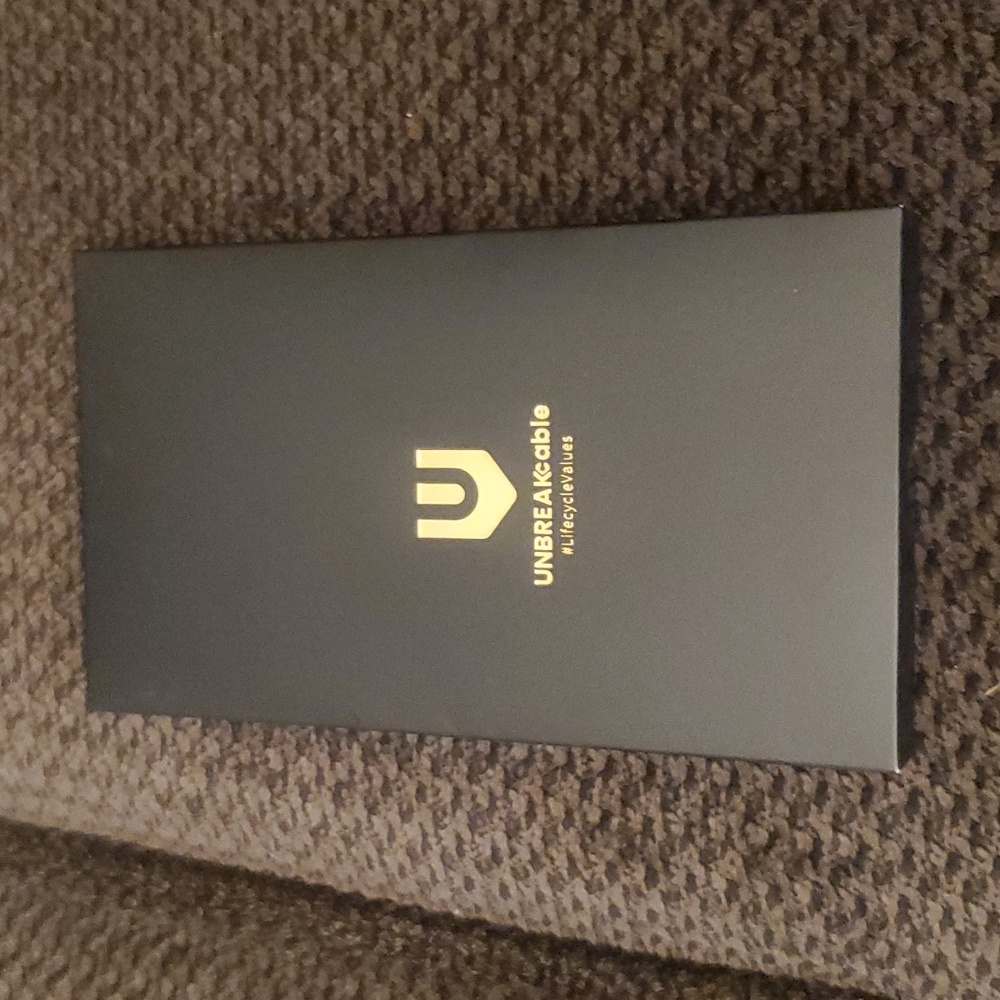 New in box UNBREAKcable iPhone 14 Case